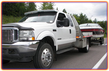 The Waconia Marine truck hauling a boat
