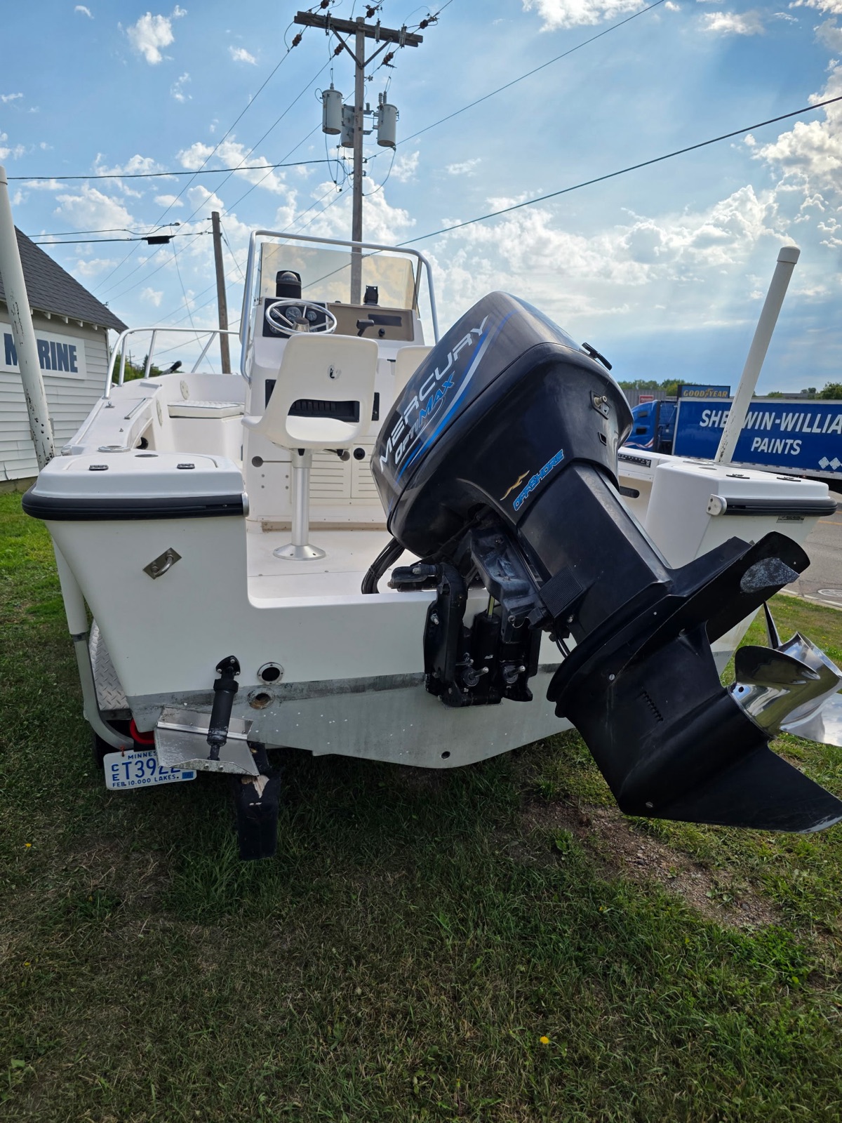 Stern view showing the Mercury OptiMax outboard